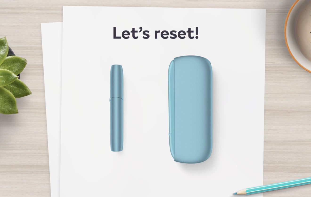 IQOS Originals DUO holder and pocket charger in turquoise color.